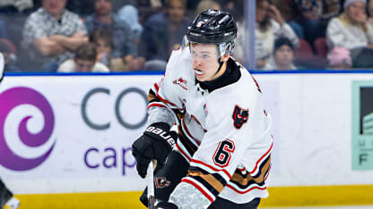 KELOWNA, BRITISH COLUMBIA - JANUARY 16: Axel Hurtig #6 of the Calgary Hitmen carries the puck against the Kelowna Rockets at Prospera Place on January 16, 2026 in Kelowna, British Columbia. (Photo by Steve Dunsmoor/Getty Images)