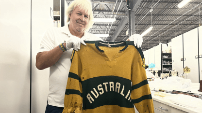 keeper of cup Phil holding 1960 AUS jersey