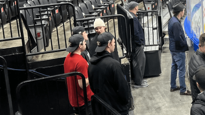 Members of the Belleville Senators watch McDavid at Edmonton morning skate