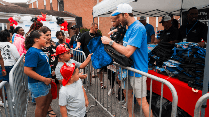 Canes, Slavin Distribute School Supplies