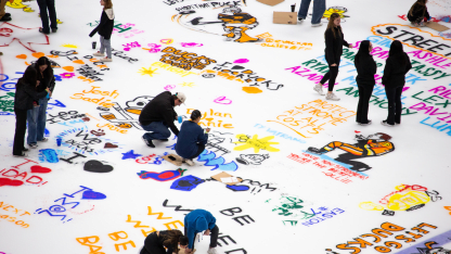 Orange Alliance Members Paint the Ice