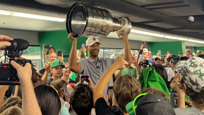 Summer with Stanley Seth Jones celebrates day with Stanley Cup at community rink