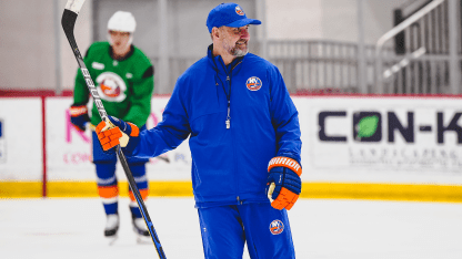 Zizing 'Em Up New York Islanders hire Peter DeBoer with playoff hopes on the line