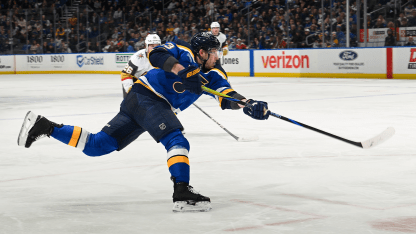 Neighbours_Blues_shooting-puck