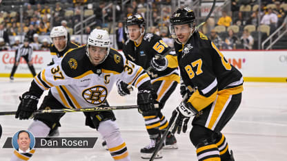 Bruins, Penguins arrive in baseball style for Winter Classic