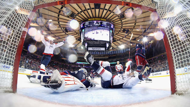 Tom Wilson scores in overtime against Igor Shesterkin at Madison Square Garden on March 05, 2025 in New York City. The Capitals defeated the Rangers 3-2 in overtime.