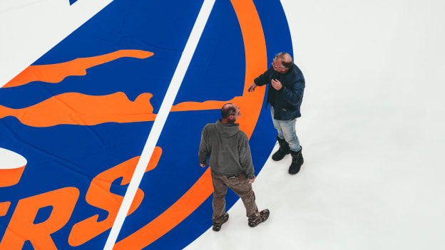 PHOTOS: Islanders Logo Painted on Ice at UBS Arena