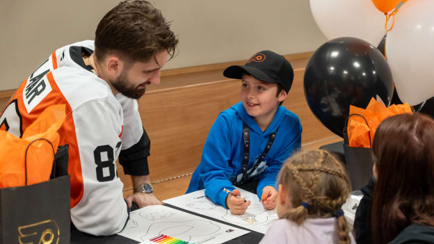 Dan Vladar working to help design his custom HFC goalie mask.