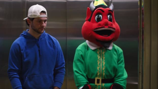 NJ Devil as Buddy the Elf in the Elevator Scene
