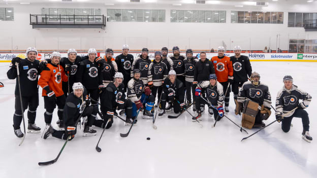 Team photo with United Heroes League Veterans and Active Duty Military Members