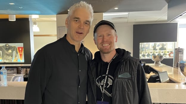 NHL Luc                Robitaille with Tommy Powell