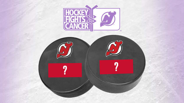 Mystery Signed Pucks • $25