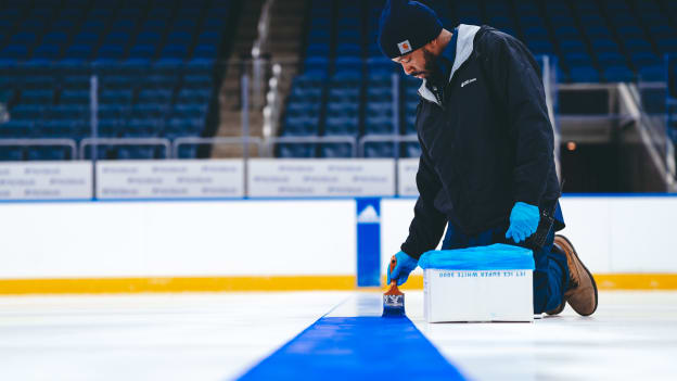 PHOTOS: Islanders Logo Painted on Ice at UBS Arena