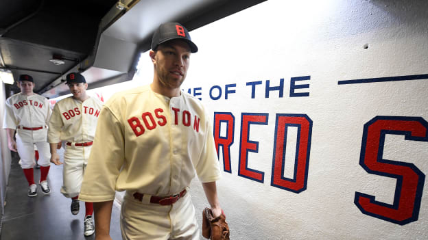 Photos: Bruins Arrive at Fenway in Red Sox Uniforms