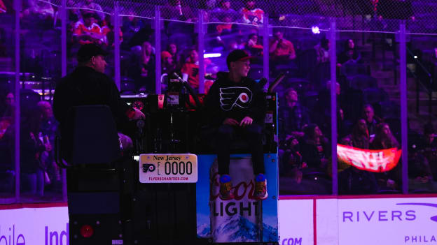 Hockey Fights Cancer honoree rides the Zamboni between periods