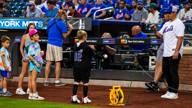 Cal Clutterbuck Throws Ceremonial First Pitch at NY Mets Game