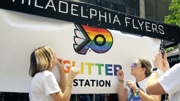 Flyers staff celebrate pride at the Flyers & Wicked Wolf Pride event