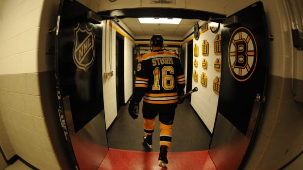 Sturm_Marco_10-10-09vsNYI_EnteringDressingRoom_Credit Steve Babineau-NHLI via Getty Images