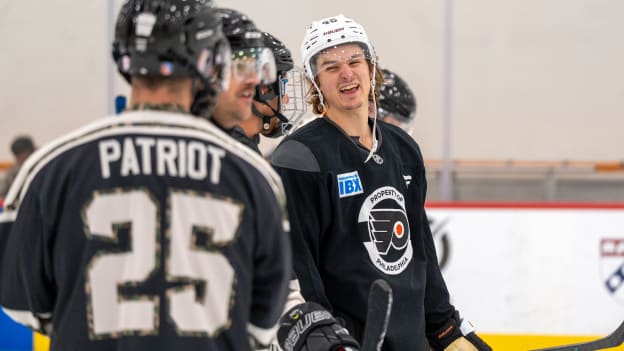 Trevor Zegras with Members of United Heroes League