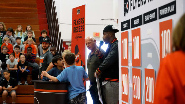 Students answer trivia questions about Hockey at Flyers Recess