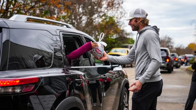Gallery: Canes Deliver Turkeys For Area Families