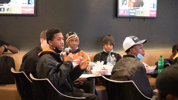 Snider Hockey kids visit the Wells Fargo center for a Black History Month panel with Flyers' Executives