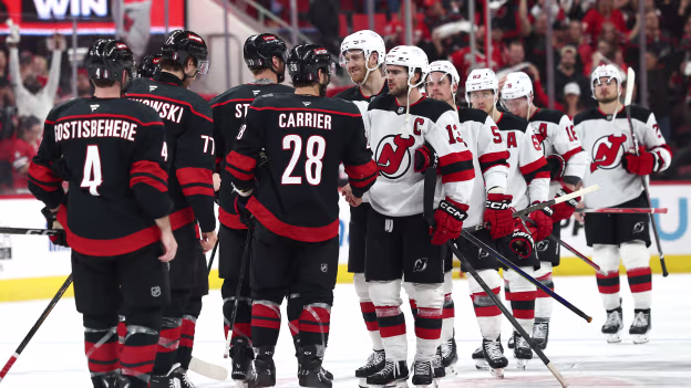 Hurricanes and Devils exchange handshakes