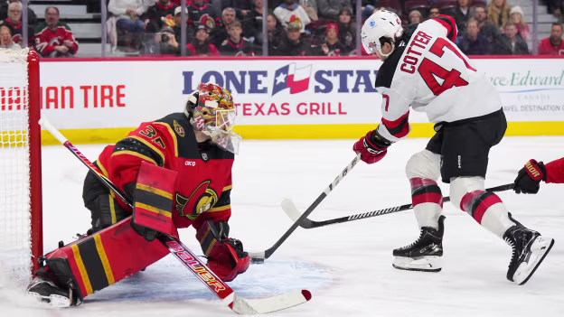 Cotter tucks in a backhand shot