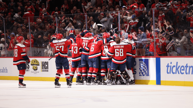 Caps Comeback to Overcome Canes in OT