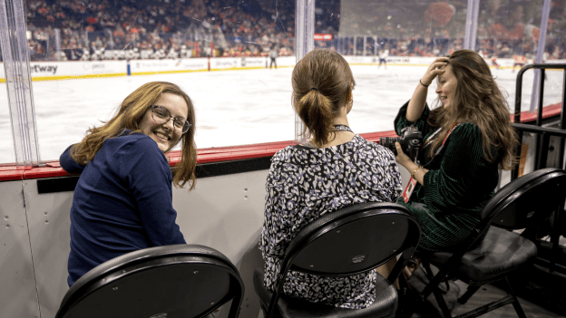 Next Shift mentees and Flyers staff capture game moments