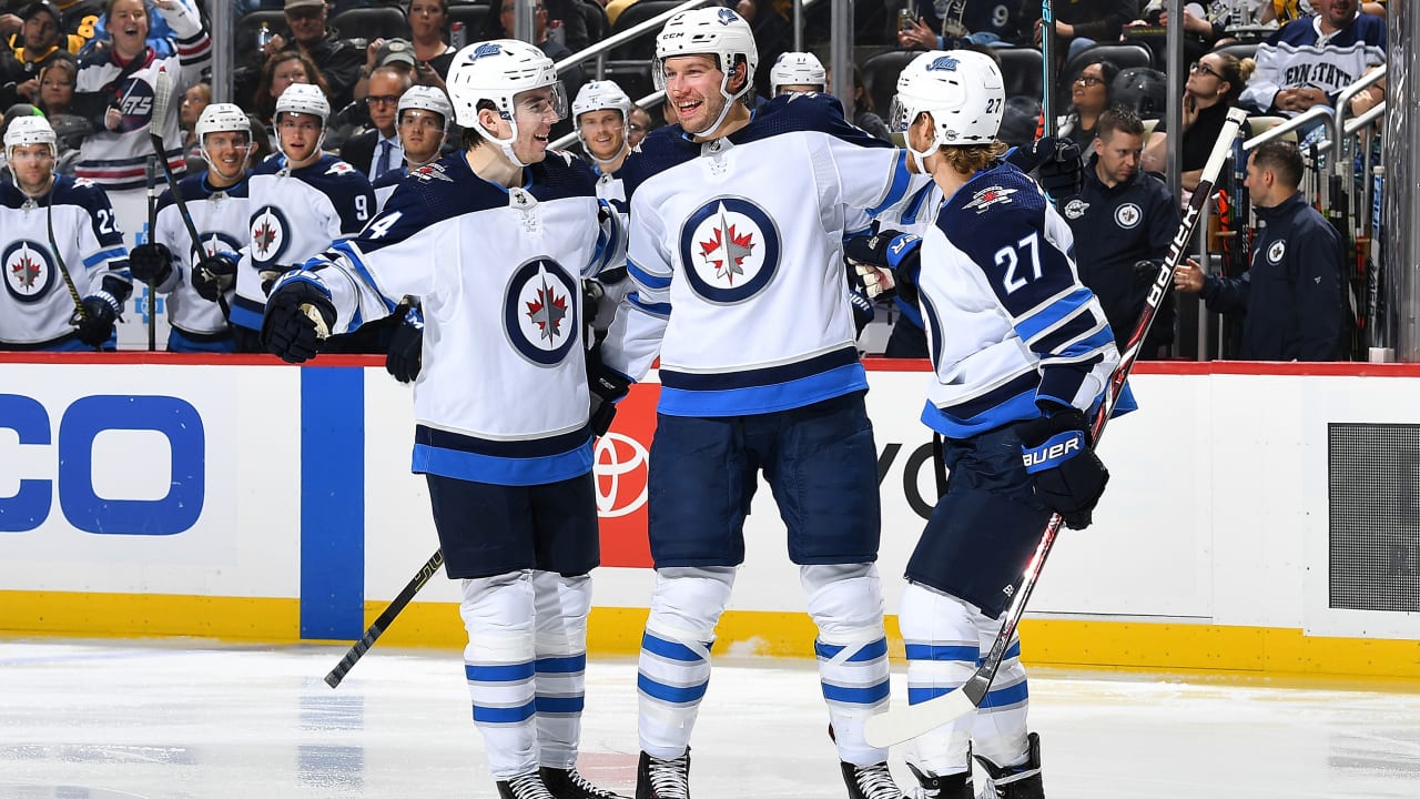 Laine gets 3rd goal in OT to lift Jets over Maple Leafs