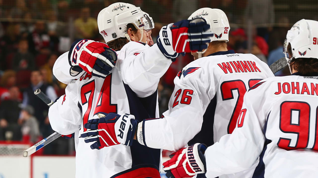 T.J. Oshie scores twice, Capitals come back to beat Devils