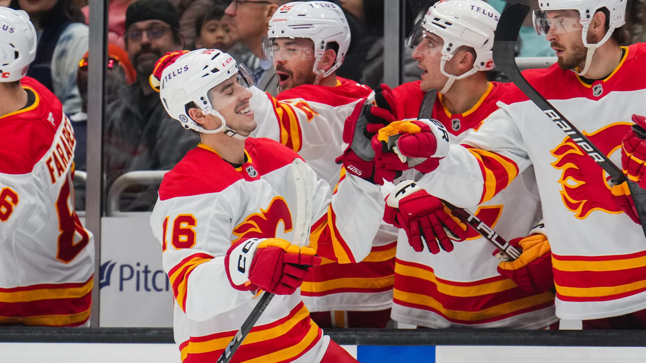 Frost gets 1st goal with Flames, who hold off Kraken