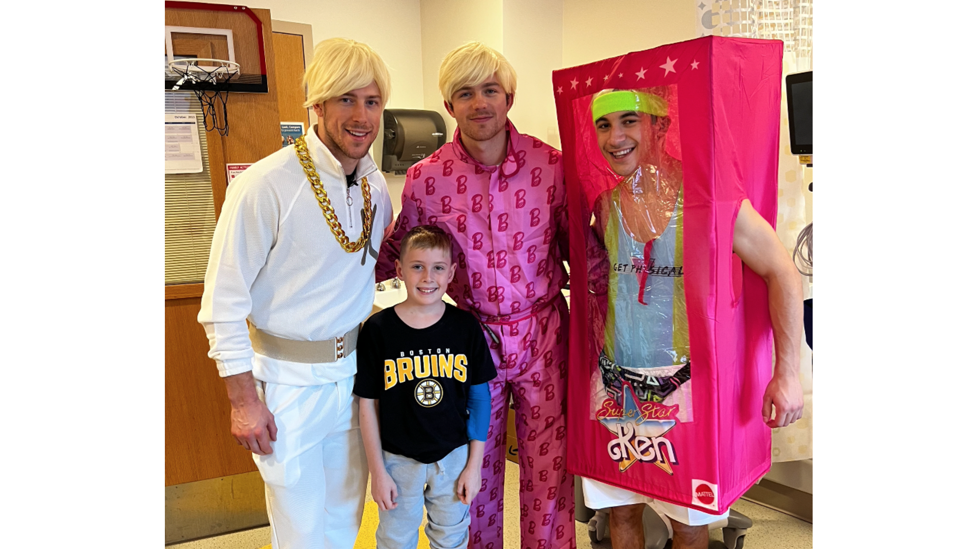 Bruins dress up in Barbie, Ken costumes for annual hospital visit