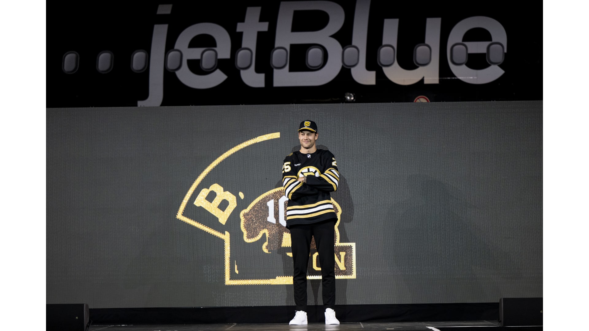Bruins Model Centennial Jerseys at JetBlue Takeoff Event