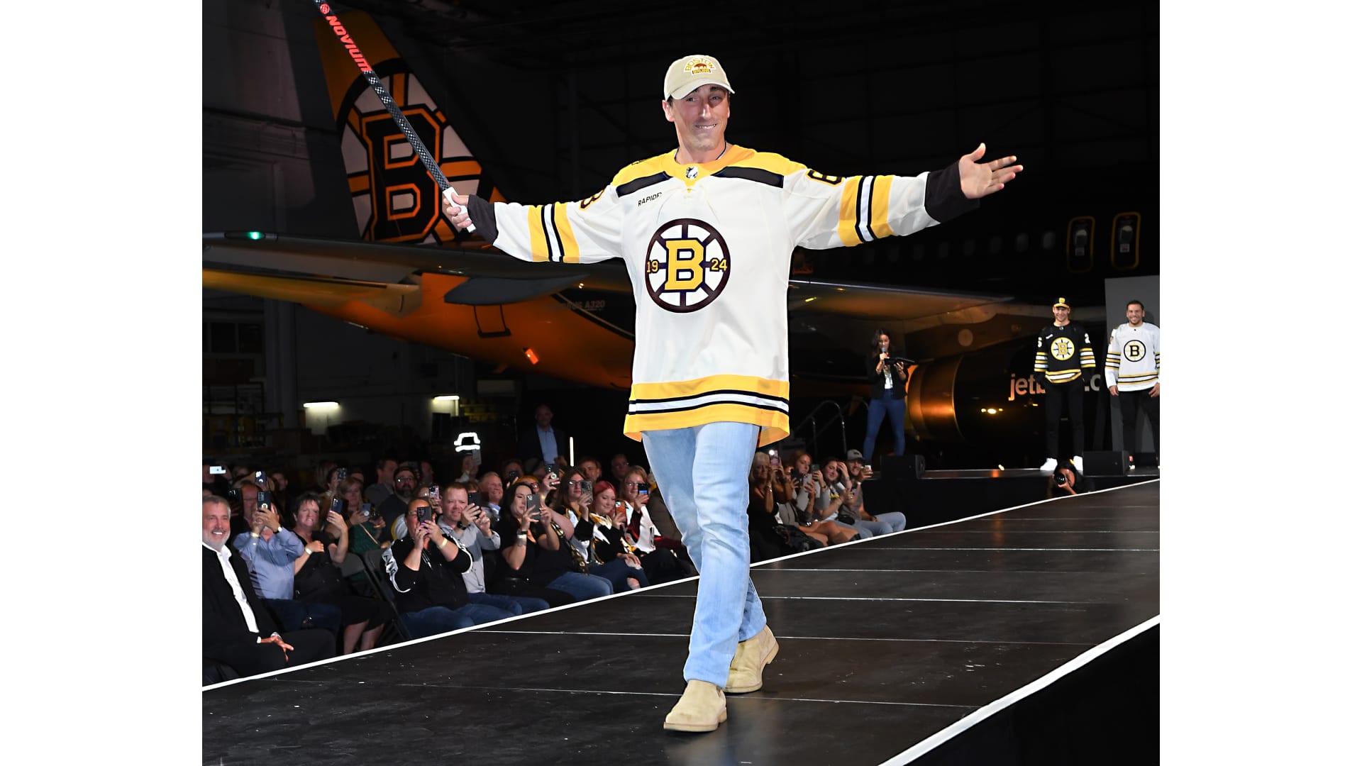 Bruins Model Centennial Jerseys at JetBlue Takeoff Event