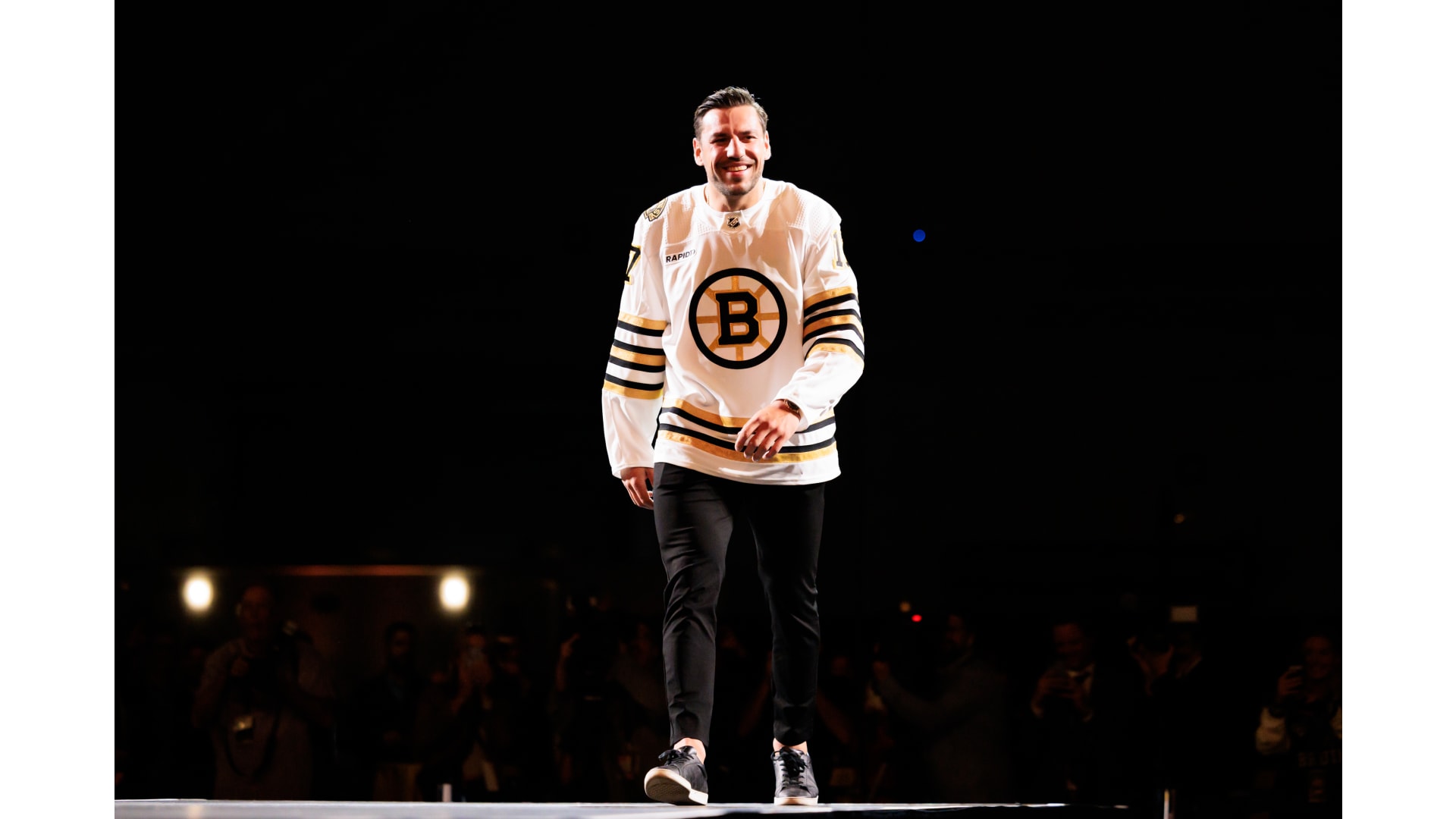 Bruins Model Centennial Jerseys at JetBlue Takeoff Event