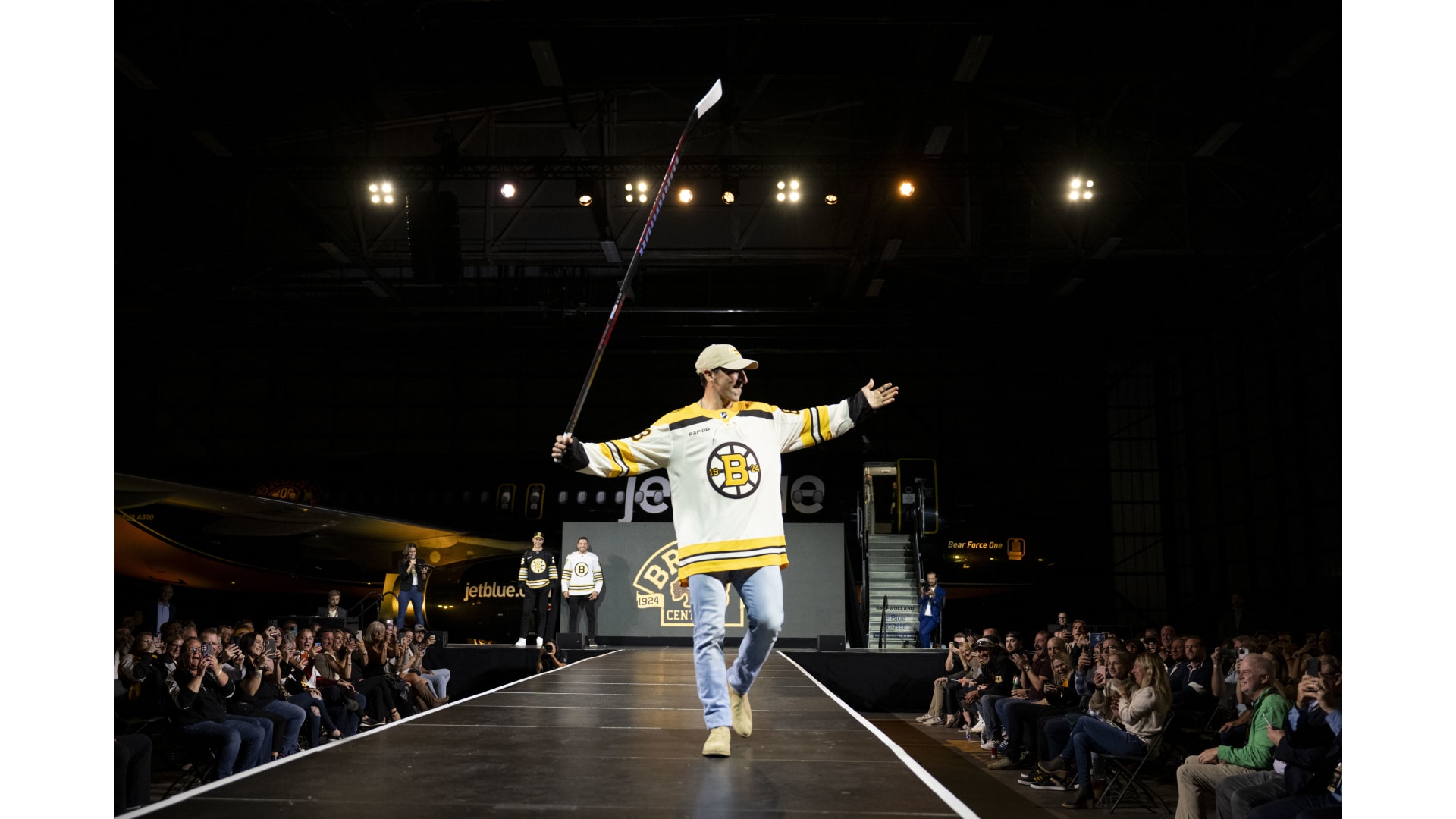 Bruins Model Centennial Jerseys at JetBlue Takeoff Event