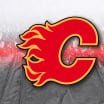 Flames return to play delayed due to additional players in COVID protocol