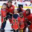 Smith of Flames stands behind niece on Hockey Fights Cancer night