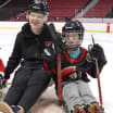 Ottawa Senators Brady Tkachuk plays sled hockey with young fan