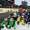 Illinois congressman Mike Quigley skates with kids prior to Winter Classic at Wrigley Field