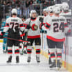 Sens fend off Sharks