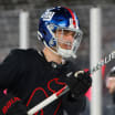 Devils Stadium Series practice Kevin Bahl wears Giants helmet