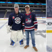 Winnipeg Jets Eric Comrie plays catch with Erik Swanson