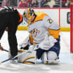 Nashville Predators goalie stick stuck in pads