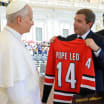 Pope Leo XIV receives custom Carolina Hurricanes jersey