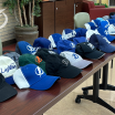 Hat Tricks for Heroes: Lightning donate thrown hat-trick ball caps to veterans