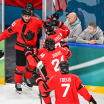 Suzuki ties the game, Canada wins in overtime and qualifies for semifinals