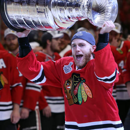 Patrick Kane #88 of the Chicago Blackhawks celebrates by hoisting the Stanley Cup after defeating the Tampa Bay Lightning by a score of 2-0 in Game Six to win the 2015 NHL Stanley Cup Final at the United Center on June 15, 2015 in Chicago, Illinois. (Photo by Tasos Katopodis/Getty Images)